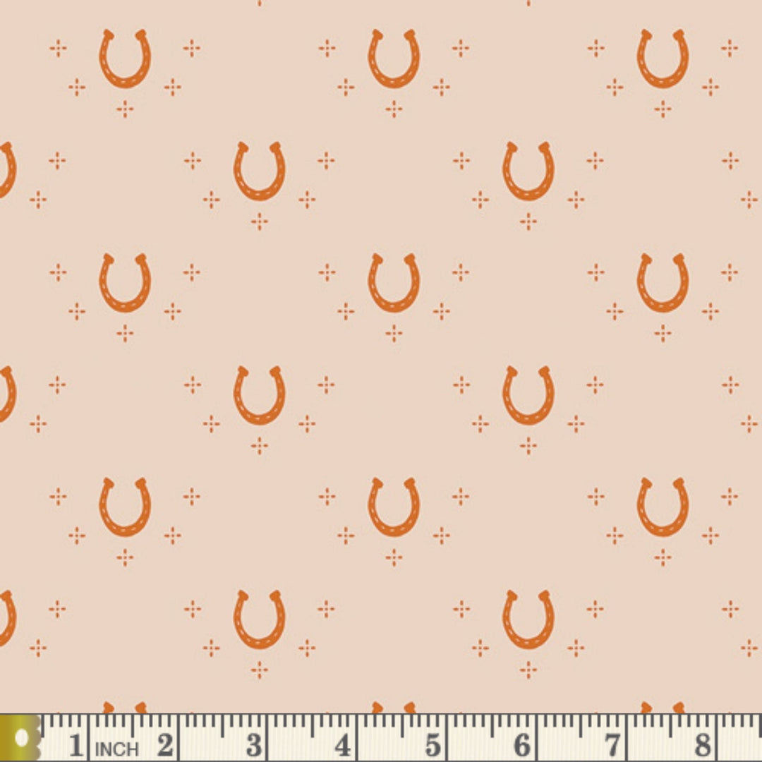 The Orchard Lucky Bend fabric swatch with measuring tape for scale