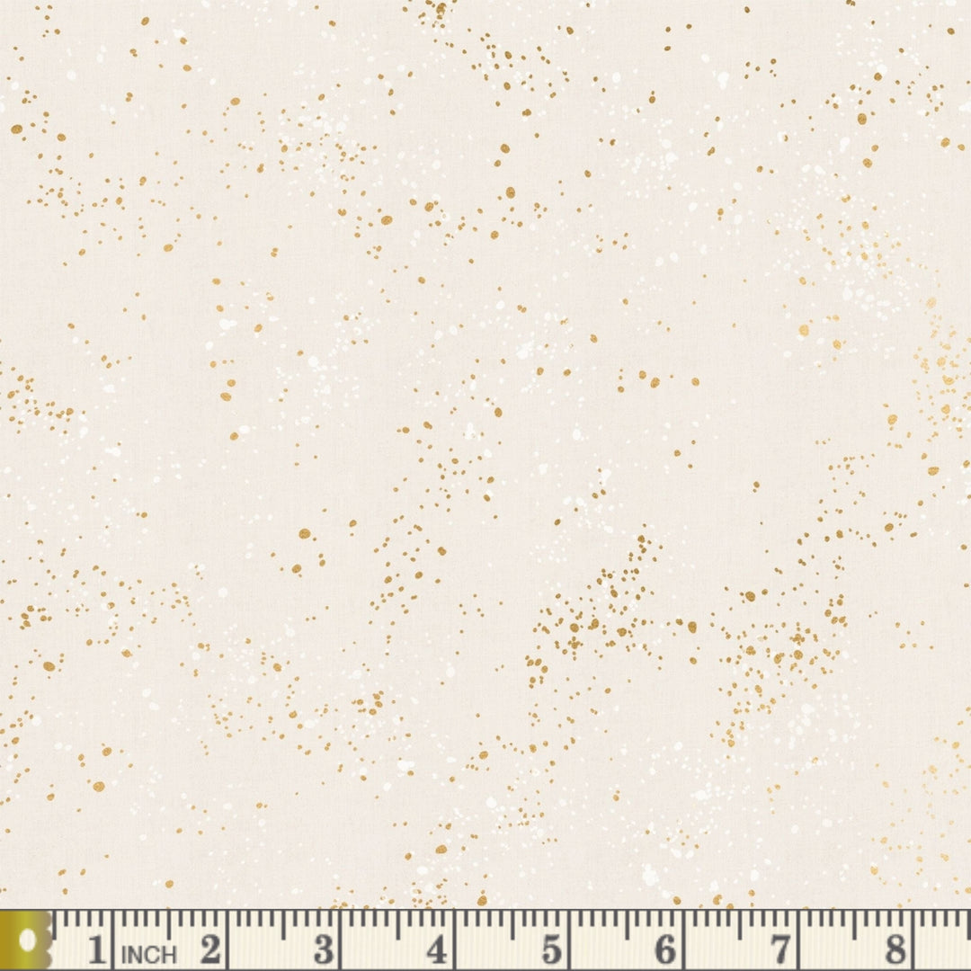 Speckled in Metallic White Gold fabric swatch with measuring tape for scale
