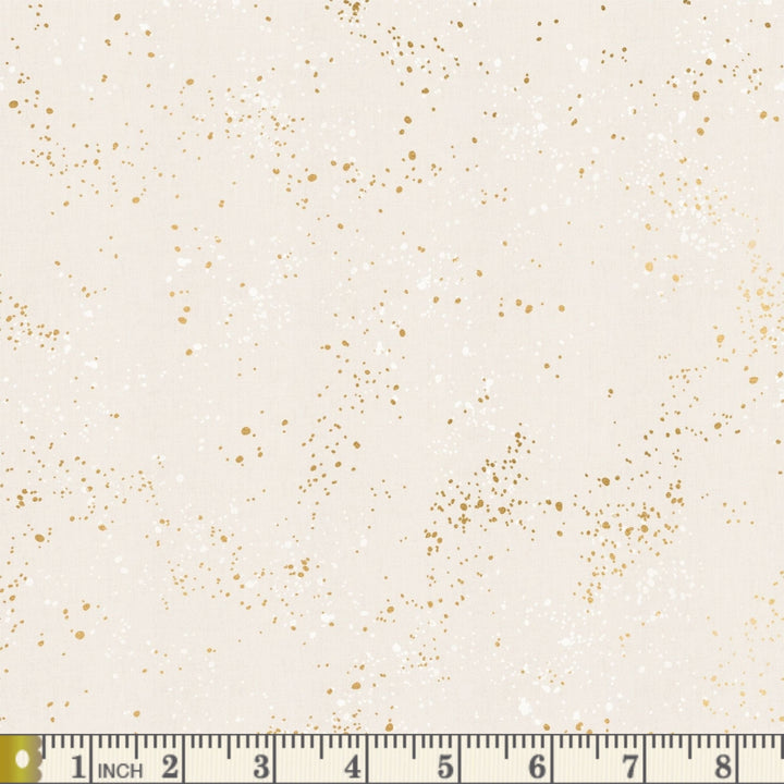 Speckled in Metallic White Gold fabric swatch with measuring tape for scale
